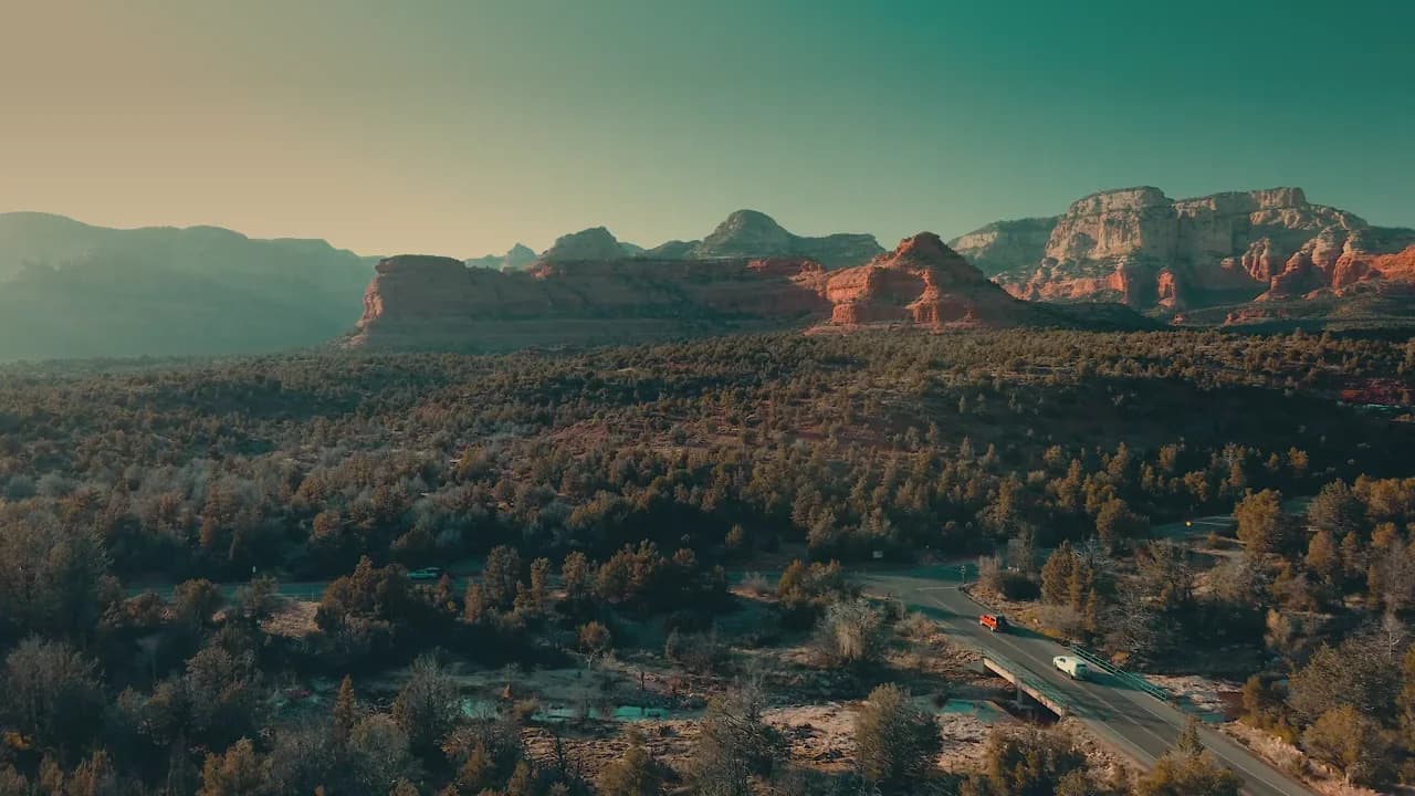 Aerial view of Sedona’s red rocks and trees